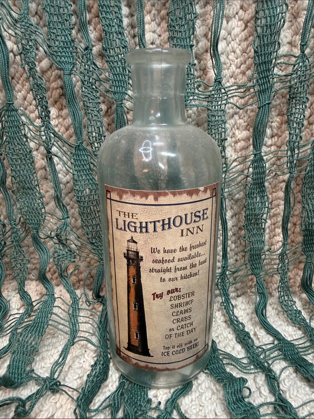 The Lighthouse Inn Decorative Glass Bottle - Beige & Brown Label